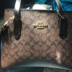 Leather coach signature handbag